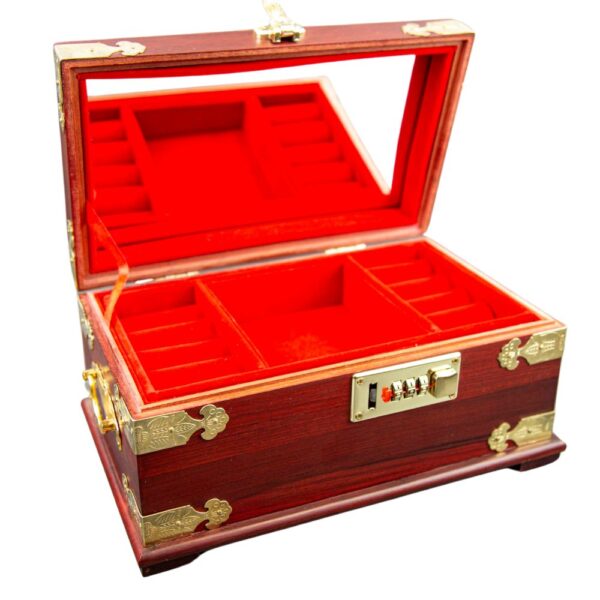 Open Chinese red velvet jewelry box with mirror and compartments Desc 1: Interior view of velvet-lined jewelry box with various storage sections
