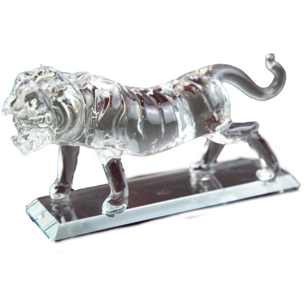 Crystal glass tiger sculpture with raised tail and detailed carving